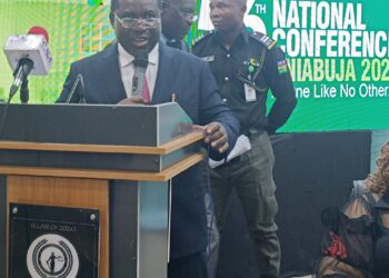 Just Four Days in Office, INEC Chairman Bags Award for Dedication