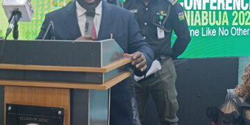 Just Four Days in Office, INEC Chairman Bags Award for Dedication